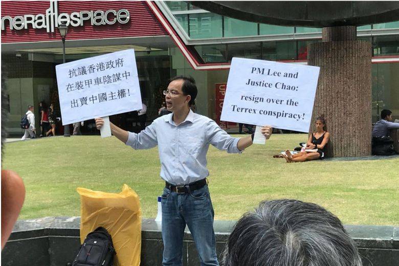 Man jailed for demonstrating in public last year arrested at Raffles Place for s.jpg