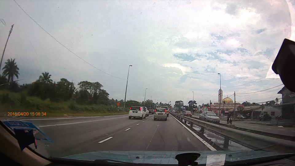 cloudy day, front vehicle  moving slow a bit distance.png