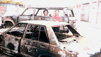 Burnt vehicles in KK.png