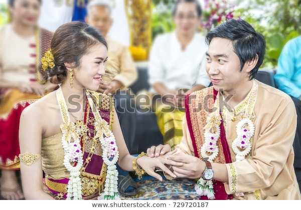 thai-wedding-tradition-watering-relaunch-600w-729720187.jpg