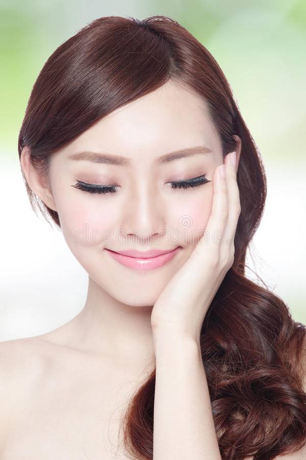 beauty-woman-charming-smile-relax-closed-eye-enjoy-health-skin-hair-green-backgr.jpg