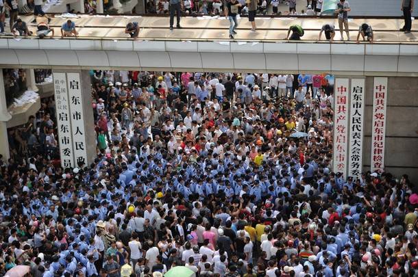 0 July 28, 2012 shows police and protesters clashing outside the local governmen.jpg