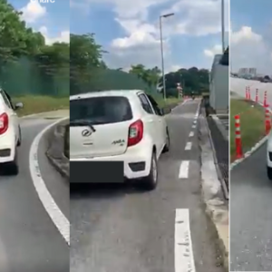 一辆白色的轿车因想省RM2.50 的大道过路费，直接占用摩多道来避开收费站!