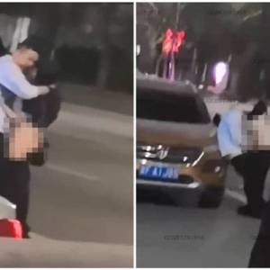 男女大街公然激战，浑然忘我不顾行人与车子