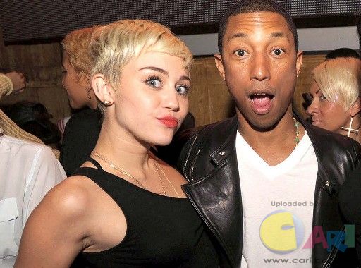 rs_1024x759-131203115526-1024.Miley-Cyrus-Pharrell-Williams-jmd-120313_copy.jpg