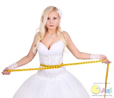 bride_with_measuring_tape.jpg