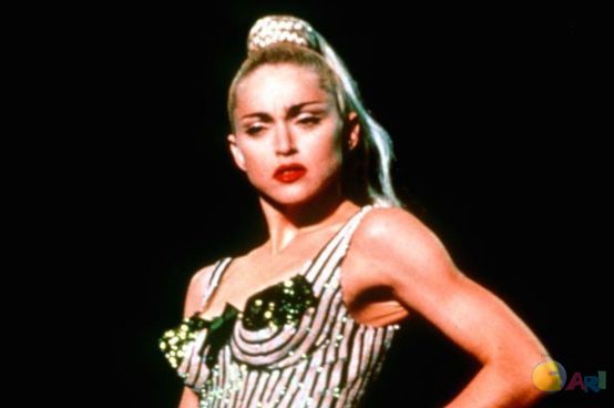 Madonna-in-concert-with-iconic-cone-bra-outfit.jpg