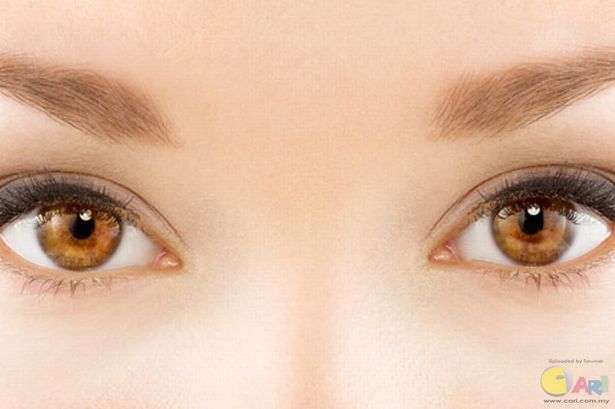 Tight shot of a model\\'s eyes and her eye makeup.jpg