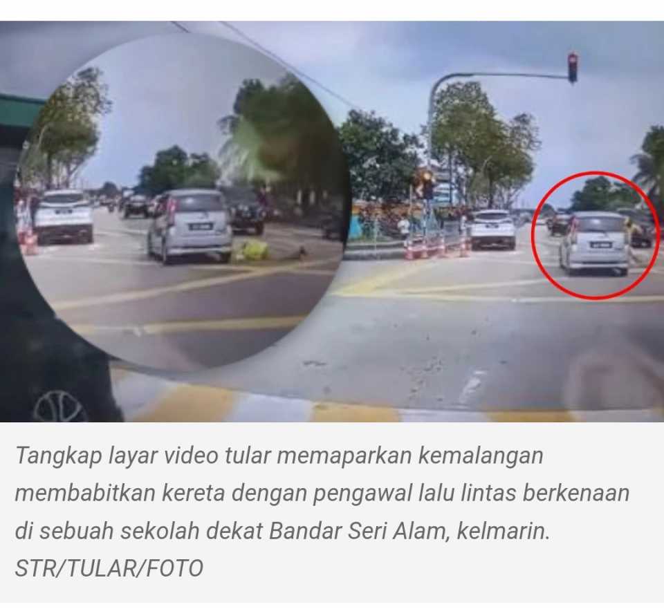 Kereta langgar lampu merah dan langgar pengawal trafik keselamatan sekolah.Pemandu kemudian salahkan pengawal berdiri tengah jalan