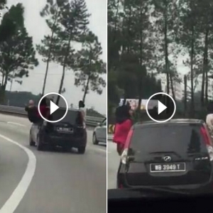 Aksi Berani Gadis 'Bertenggek' Di Tingkap Kereta Bergerak Ke Genting Highlands Jadi Viral