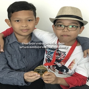 Dua Pelajar Sarawak Rangkul Pingat Emas Di Pertandingan Matematik Dunia