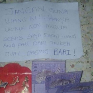 Jangan Guna Duit Ini!-Enggan Terima Angpau Dari Tauke Jual Babi, Peniaga Dikecam