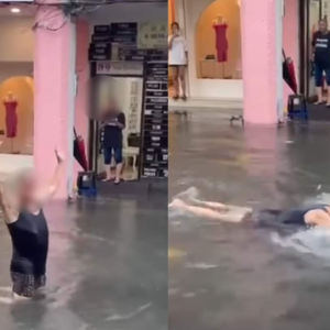 Warga Asing Syok Berenang Dalam Air Banjir Bawah Komtar Penang, Tak Sedar Ada Ular Besar