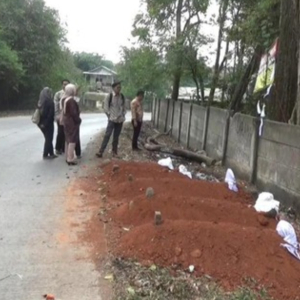 Buat Kubur Tepi Jalan, Elak Orang Buang Sampah