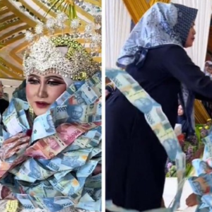 Pasangan Pengantin 'Tenggelam' Dalam Kalungan Wang