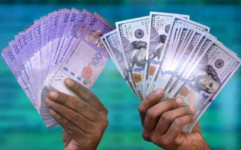 Momentum belian lemah, ringgit jatuh berbanding dolar AS